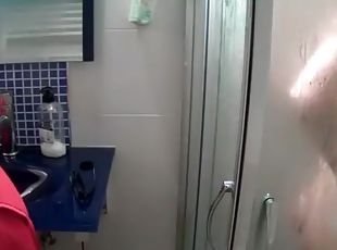Skinny teenage girl finishing her shower