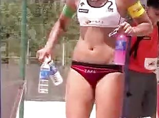 Cute beach volleyball players with great bodies