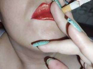 Smoking with red lipstick