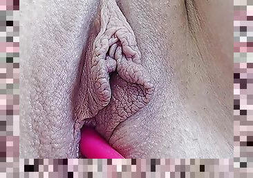 very massive thick labia pulsate from the vibrator