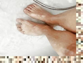 Feet in the shower to go
