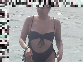 MILF in black bikini beach voyeur clip