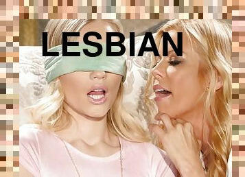 Two glamorous blonde ladies licking with passion and lust