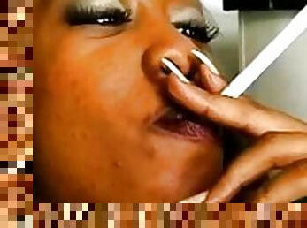 Black chick smoking and looking hot