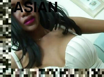 Sexy Asian transexual in white dress jerks off