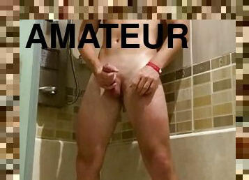 Fit guy jerks off a cute dick in the shower in front of the camera