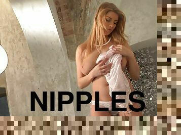 Blonde Angel is sucking her own nipples