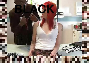 Tattooed redhead takes on huge-ass black cock