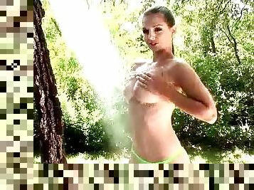 Eve Angel takes a sexy outdoor shower