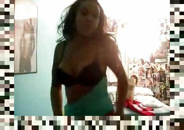 Webcam girl dances in the light