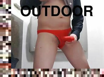 Masturbating outdoors with a sexy thong