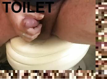 Masturbating on the toilet in the bathroom