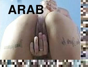 Arab mommy masturbating with dildo doggystyle