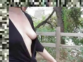 Exhibitionist girl shows her tits in public