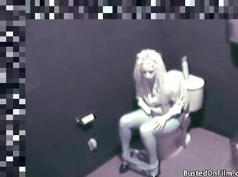 Bathroom camera captures girl masturbating on toilet