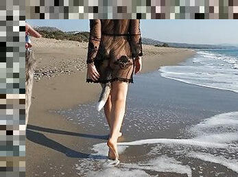 Sexy woman at the beach takes a foxtail butt plug in her ass - public outdoor anal plug