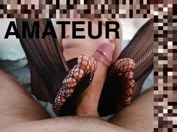 Sexy blonde in pantyhose gives a Footjob a huge dick (POV)