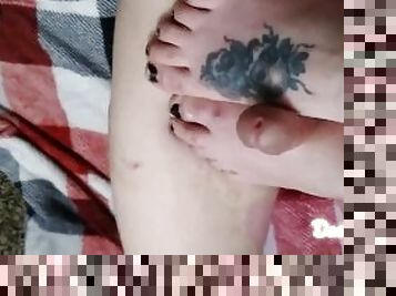 Tattooed footjob from milf