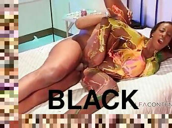 A Black Girl In Several Colors Is Planted On A Dick
