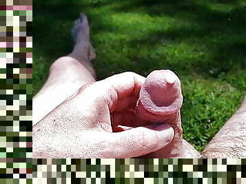 Small dick pissing an cumming on self oustide