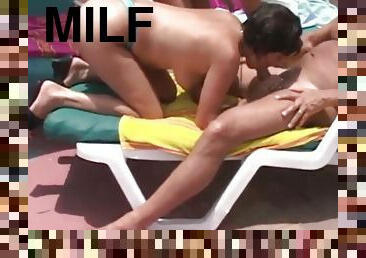 gorgeous milfs having public sex at the resort