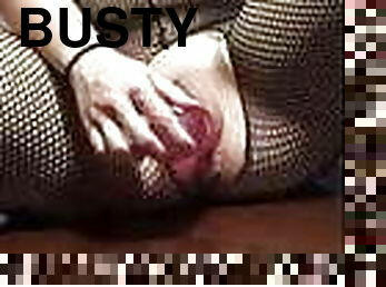 Busty lady in fishnets lets some steam on the floor