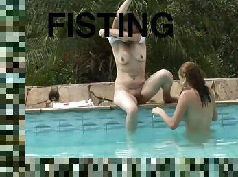 Anal fisting by the pool