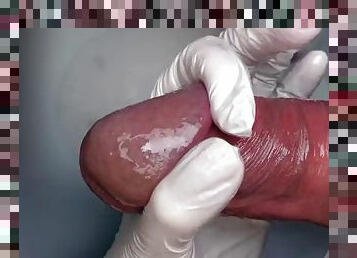 Super close-up handjob in white latex gloves with commentary