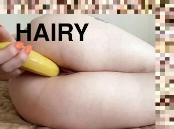 Beautiful girl masturbates with a big banana