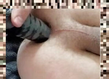 Shoving a 2 inch thick black dildo in my ass…