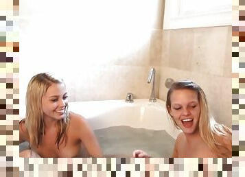 Teen blonde lesbian bathing with bff