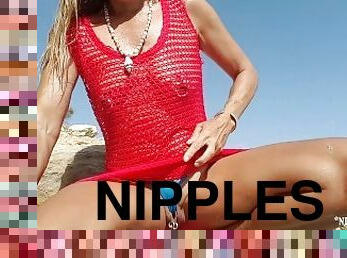 nippleringlover in fishnet dress & micro string at nude beach flashing pierced tits & pierced pussy