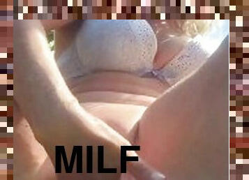 Dirty milf having Squirt orgasm in the garden.