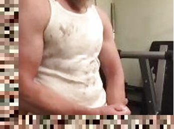 Muscular guy flexing in a dirty wifebeater and shooting cum!