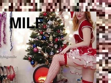 Mrs Claus outfit beautiful redhead dance tease near ChristmasTree