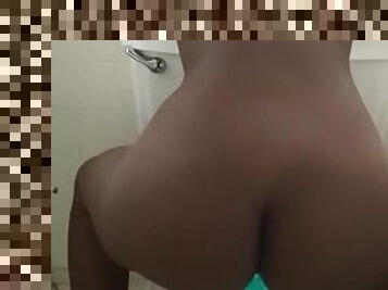 Sexy black girl rides dildo in bathroom
