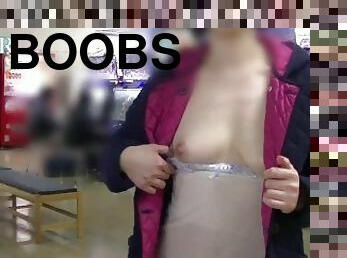 ?????????????????????????????????????????????????Exposed boobs at the game center?