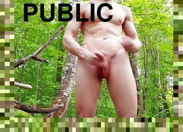 hot muscular guy masturbates in nature