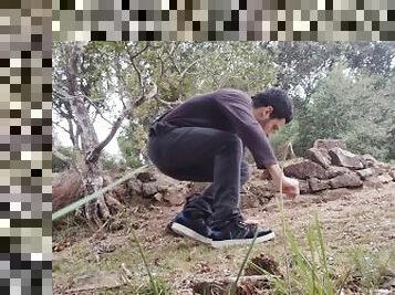 Boy Very nervous puts his dick outside jeans / and piss at the woods