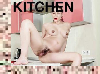 Janetta Strips Naked And Masturbates In A Kitchen