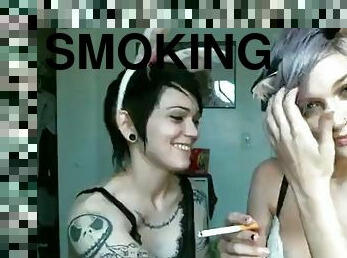 2 sexy girls smoking