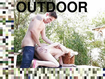 Curly redhead Abbey Rain freaky outdoor sex