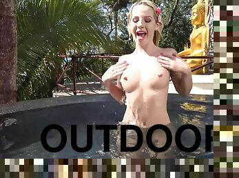 Outdoor posing and sensual fingering with blonde teen