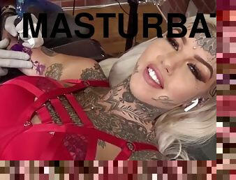 Alternative girls pussy is masturbated during a tattoo session