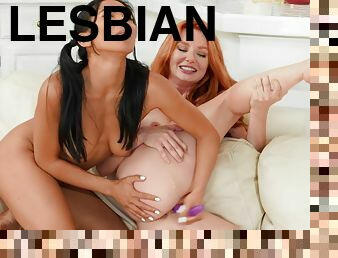 Lesbian girlfriends sharing sex toy
