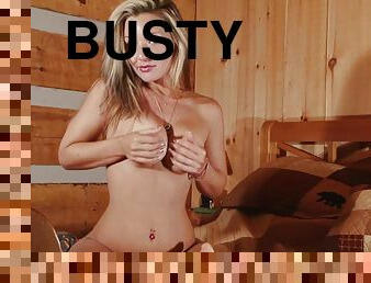 Playful busty blonde Christina in sauna solo