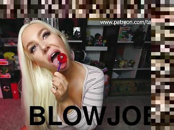T.B. - Blonde with deep cleavage sucking on lollypop on webcam