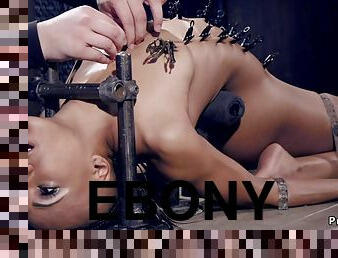 Ebony suffers extreme bondage positions