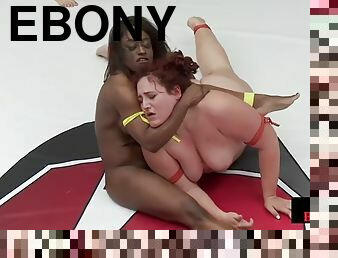 Ebony lesbian wrestling fights against redhead BBW