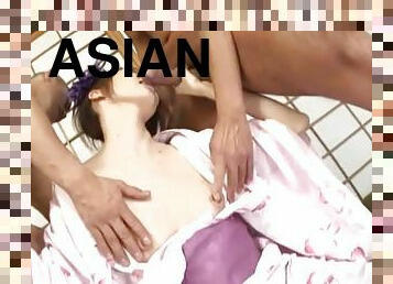 Sexy asian wearing a kimono gets banged by two hard cocks